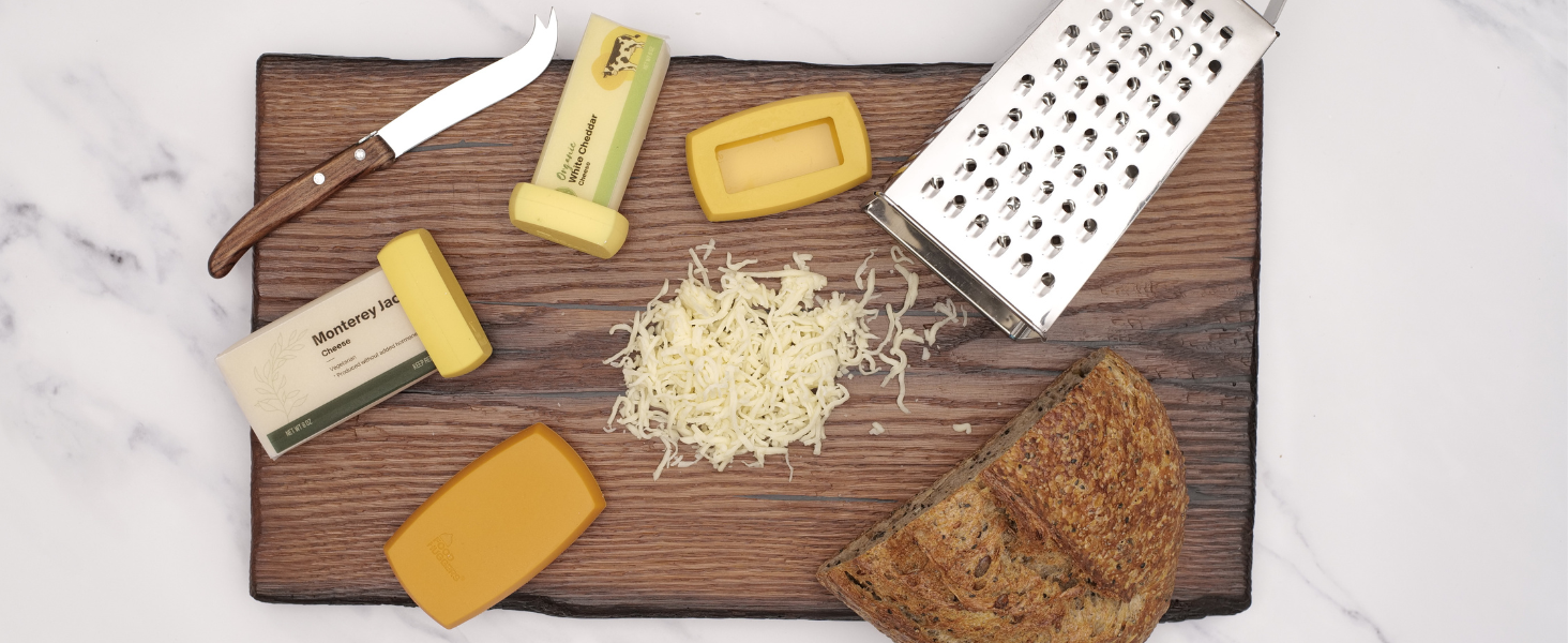 Reusable silicone food savers called cheese huggers protecting opened cheese