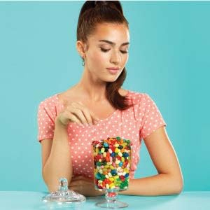 Woman with jar of Jelly Belly jelly beans